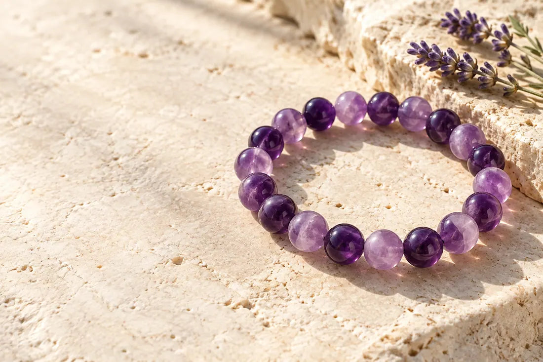 Amethyst-only bracelet on warm limestone