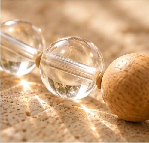 Macro photograph of clear crystal bracelet bead
