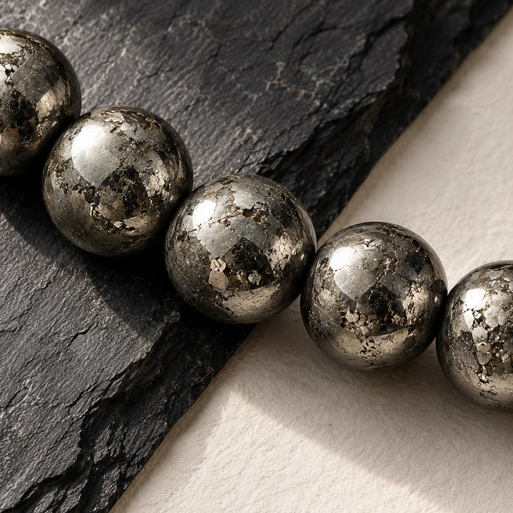 Close-up of metallic grey pyrite beads