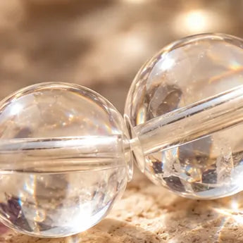 Clear crystal bead close-up with light passing through