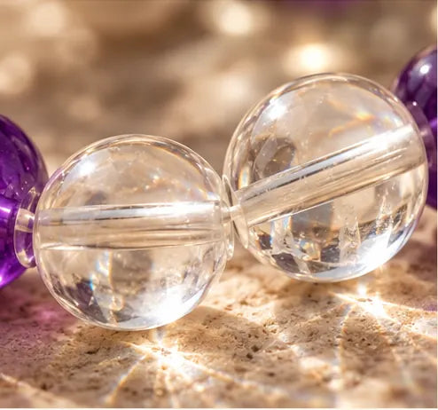 Macro detail of transparent clear quartz bracelet beads refracting light