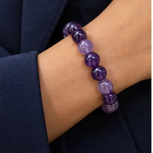 WORN WITH STYLE · A line of purple at the wrist