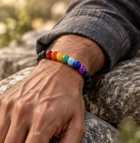 Man wearing seven colour and lava bracelet with charcoal sleeve