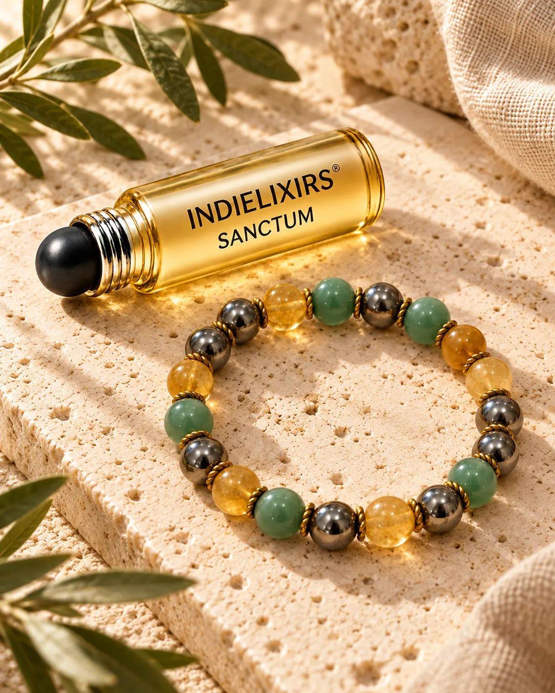 SANCTUM roller beside a complete Wealth Bracelet